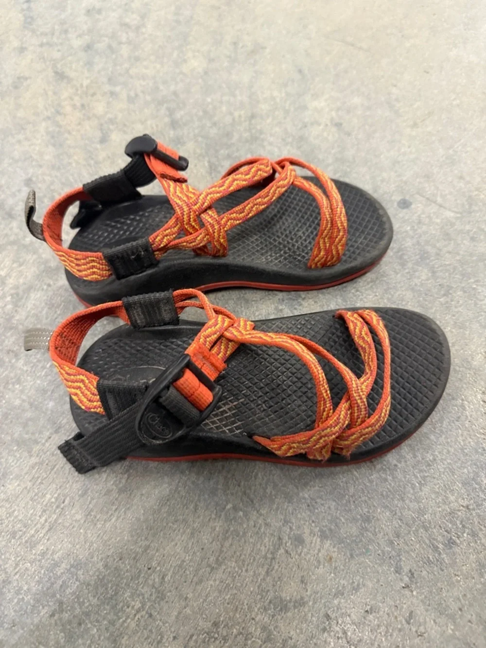 Orange Strap Outdoor Sandals on Black Footbed